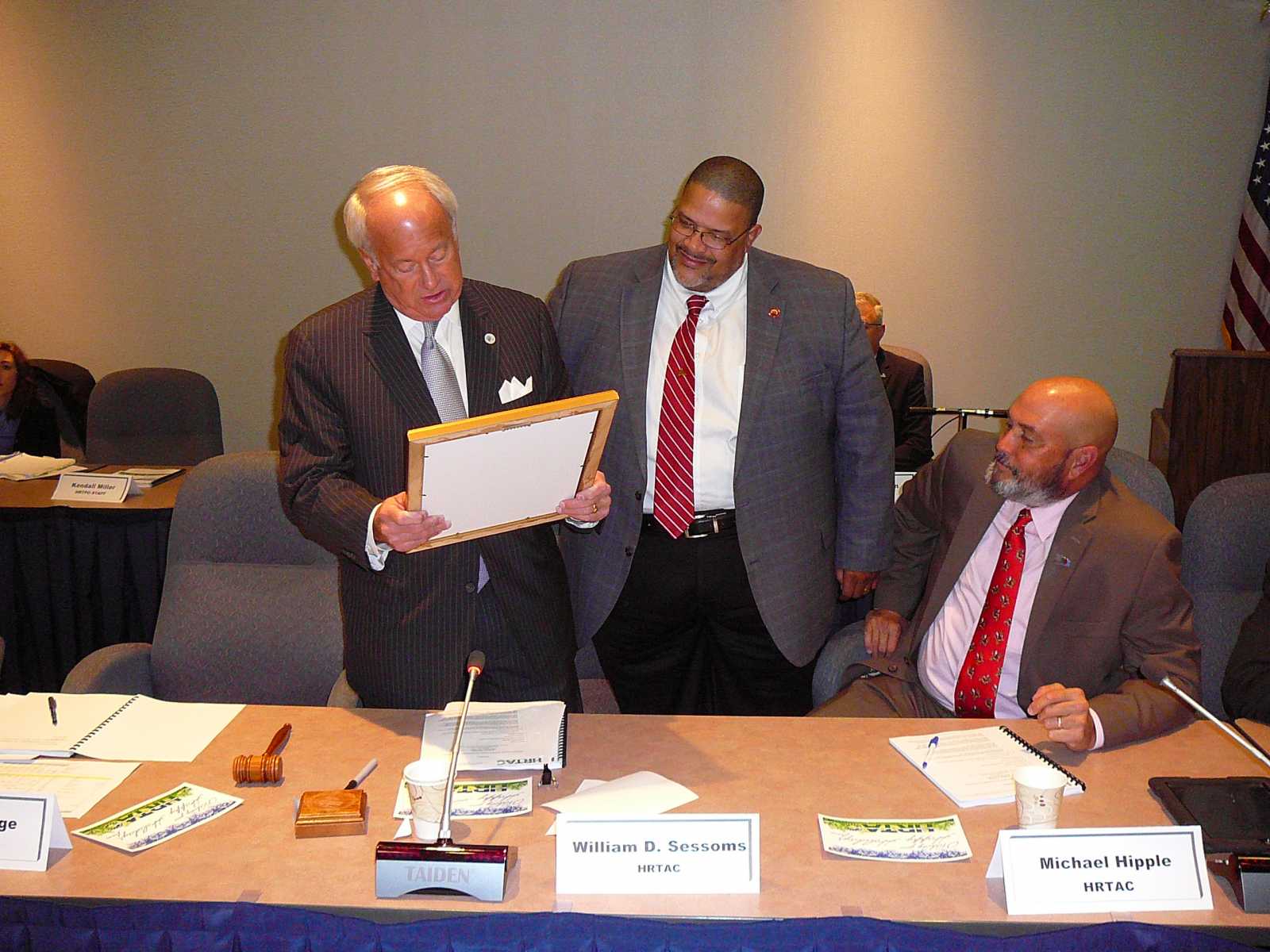 HRTAC Chair William D. Sessoms Jr. Presenting a Resolution of Appreciation to HRTAC Member Kenneth W